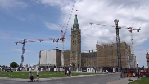 Wide view of Peace Tower and Centre Block under renovation with cranes Stock Footage 341892658