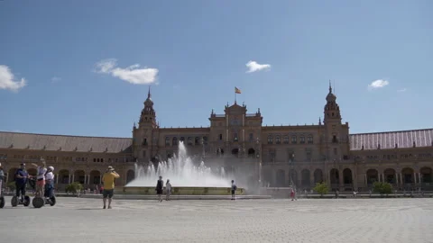Wide view of the Plaza de España in Seville with tourists walking Stock Footage 147183546