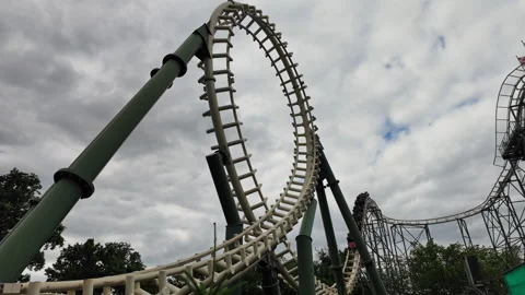 Wide view of the Python rollercoaster in the Efteling amusement park going Video stock 337745158