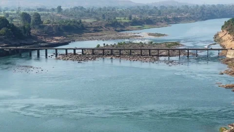 Wide View of River and Low Bridge Vídeo Stock 330977786