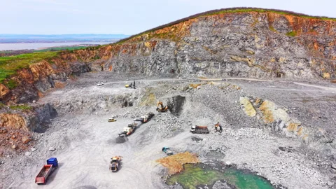Wide view of rock quarry pit with turquoise pool, Bulgaria Stock Footage 339001970
