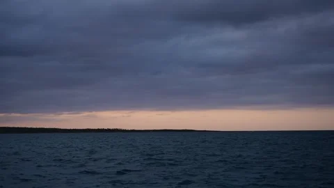 Wide View of Rough Seas at Sunset Stock Footage 305957338