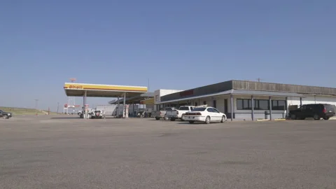 Wide View of Shell Gas Station during the day Stock Footage 139313612
