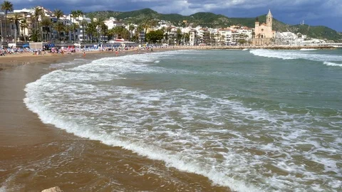 Wide view of "SITGES" from the beach. Stock Footage 90282649