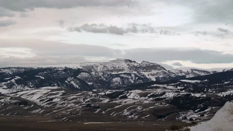 Wide view of Sleeping Indian mountain range in Jackson Wyoming with snowy hi Stock Footage 150783751