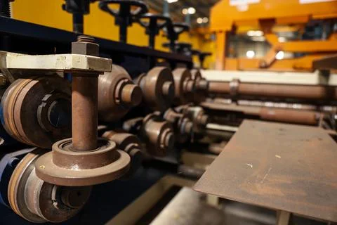 A wide view of the slitting machine inside the industrial unit or factory Stock Photos