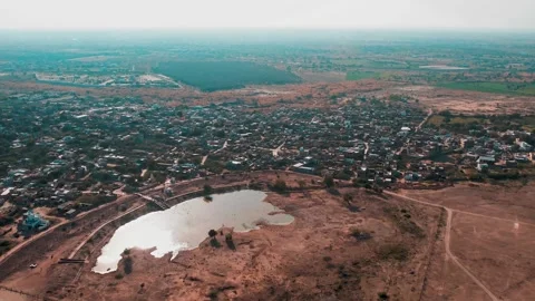 Wide View Small Town Settlement With Lake And Urban Layout Stock Footage 329197256
