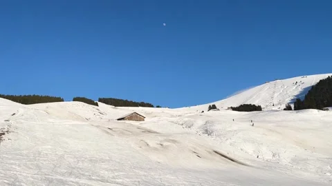 Wide view of a snow-covered ski slope in Megeve, Haute-Savoie, French Alps Stock Footage 346707429