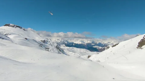Wide view of snow, mountains and clouds at ski resort Les 2 Alpes in France. Video stock 202320750