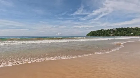 Wide View of Sri Lanka Beach with Large Waves and Person Diving Stock Footage 339942943