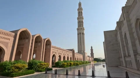 Wide View of Sultan Qaboos Mosque with Arches and White Minaret in Oman Stock Footage 339889739