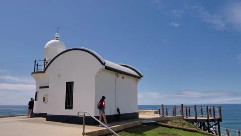 Wide view of Tacking Point Lighthouse, P... | Stock Video | Pond5