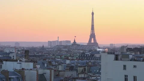 Wide view time lapse of the rooftops and buildings at paris france with Stock Footage 195111134