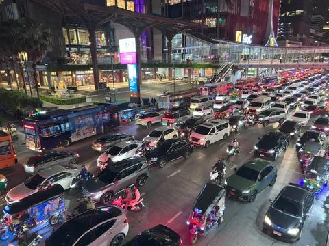 Wide view of traffic gridlock seen from the skywalk connecting major shopping Stock Photos