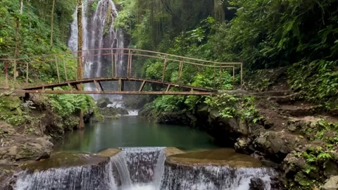 Wide View Of Tropical Waterfall And Bridge Over Cascade In Bali Stock Footage 342194870
