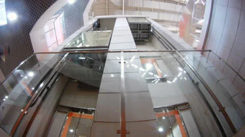 Wide view of two elevators going up and down, timelapse Stock Footage 26086265