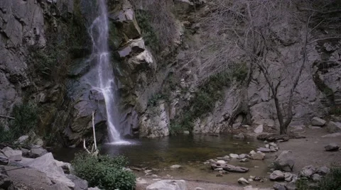 Wide of waterfall in canyon left frame Stock Footage 60735276