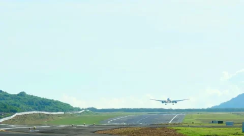 Widebody jet airplane touch down the runway, International Phuket Airport, Thail Stock Footage 45570903