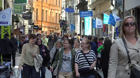 Wider angle of busy street in Gamla Stan Stock Footage 44149544