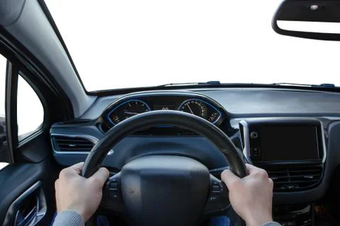 Wider view from the driver's angle on car steering wheel, interior and naviga Stock Photos