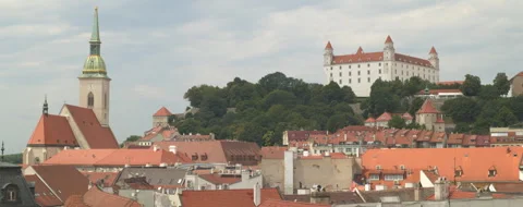 Widescreen shot of Bratislava Castle with cathedral in foreground in Slovakia Stock-Footage 283042045