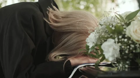 Widow Putting Her Head on Casket Lid at Funerals Stock Footage 232774500