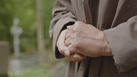A Widows Grief Silent Hands That Speak of Love and Loss Stock Footage 321036374