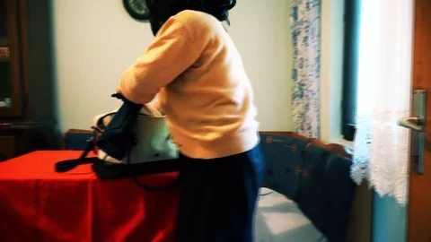Wife packaged stuff in the bag Stock Footage 97500894