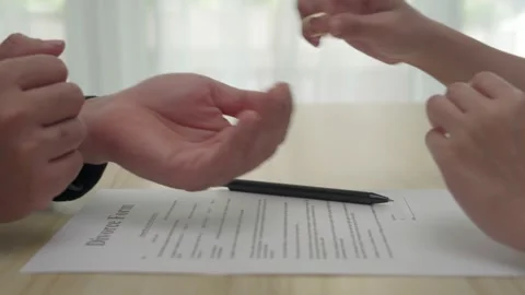 The wife returns the wedding ring to her husband on the day of the divorce. C Stock Footage 217968860