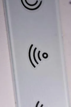 WiFi icon on device close up Stock Photos