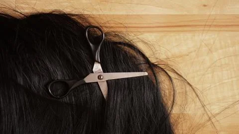 Wig and scissors - black wig - hairstyle background Stock Photos
