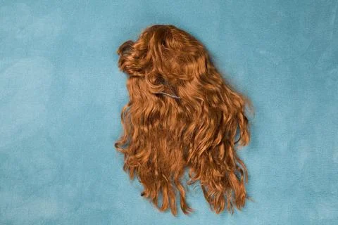 Wig on carpet Stock Photos