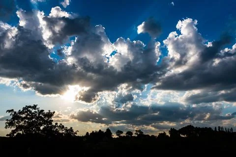 Wild angle view of a back light on the clouds Stock Photos