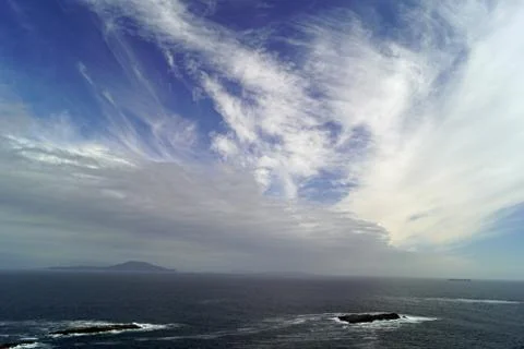 Wild Atlantic Way clouds at Keem Beach Stock Photos