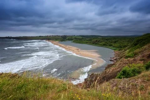 Wild beach in the morning Stock Photos