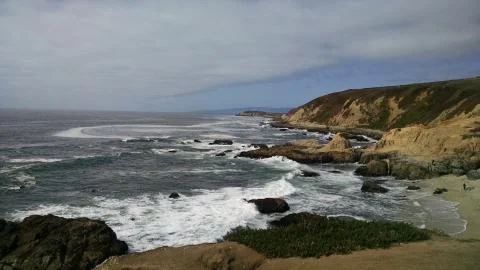 The Wild Beach seen from the cliffs, Highway One Stock Photos