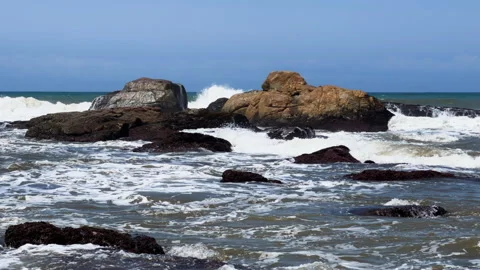 Wild beach with waves breaking on rocks, North Coast, Kwazulu Natal South Africa Vídeos de archivo 243358663