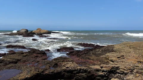 Wild beach with waves breaking on rocks, North Coast, Kwazulu Natal South Africa Video stock 243731818