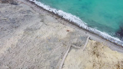 Wild beach, to which you need to go down after overcoming 400 steps. Stock Footage 151769184