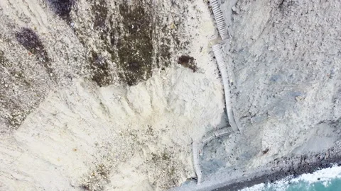 Wild beach, to which you need to go down after overcoming 400 steps. Stock Footage 151954194