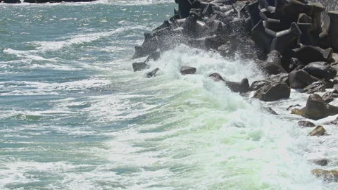 Wild Black Sea Waves Beat the Rocks on the Shore Stock Footage 311028000
