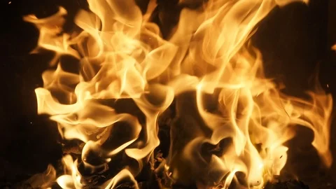 Wild burning fireplace flames #3 with sparks - slow motion Stock Footage 119882584