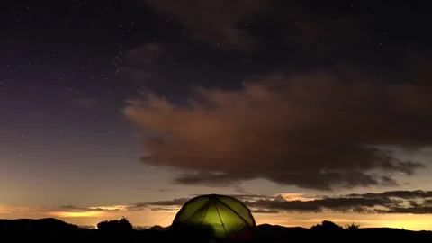 Wild camping night sky timelapse with stars and clouds Stock Footage 324852988
