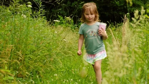 Wild Child on a backyard hike Stock Footage 340922250