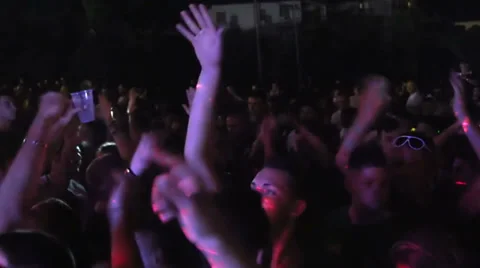 Wild crowd dancing in a outdoor disco -  concert Stock-Footage 28504565