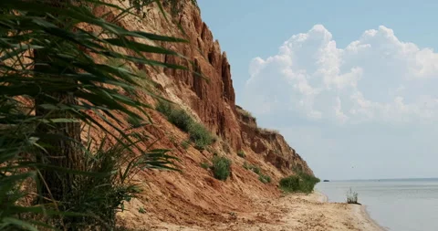 Wild empty tropical mountain beach, calm sea ocean water on the sandy coastline Stock-Footage 170617438