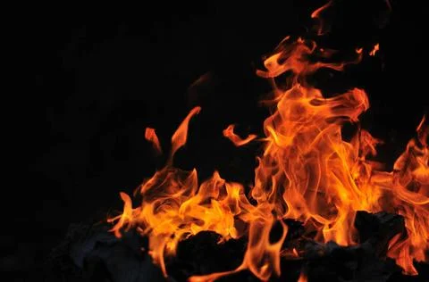 Wild fire wild fire flames burn hot with black background ,model released,... Stock Photos