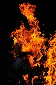 Wild fire wild fire flames burn hot with black background ,model released,... Stock Photos