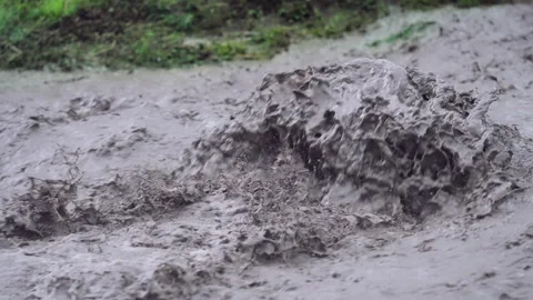 Wild Flood Stream Rushing Through Ravine With Force of Nature, weather phenomena Stock Footage 336929387
