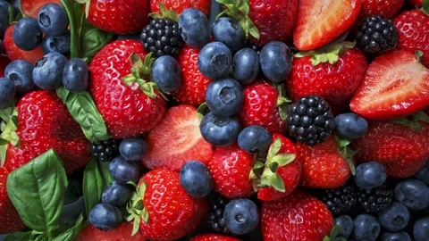 Wild forest berries on black background, collection of strawberry, blueberry and Stock Footage 138342084